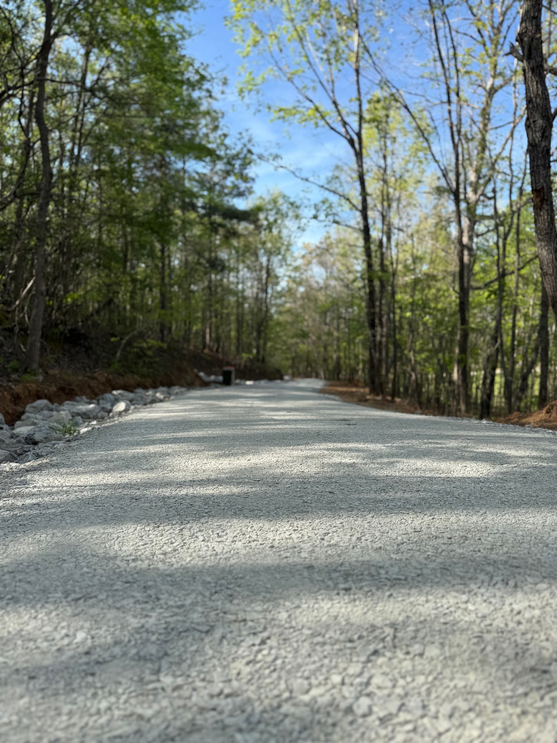 Gallery photos for Gravel Driveway Cut Through Wooded Property and Ready to Build: Image #1